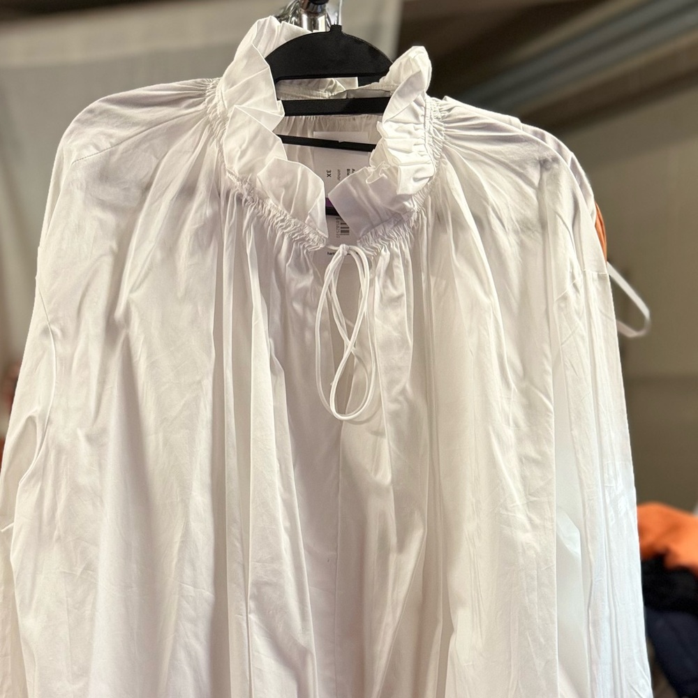 Harshman Saks fifth Ave brand blouse. MSRP $200.  Different styles on photos